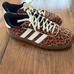 Adidas Women’s brand new no box or tags leopard and orange size 8
